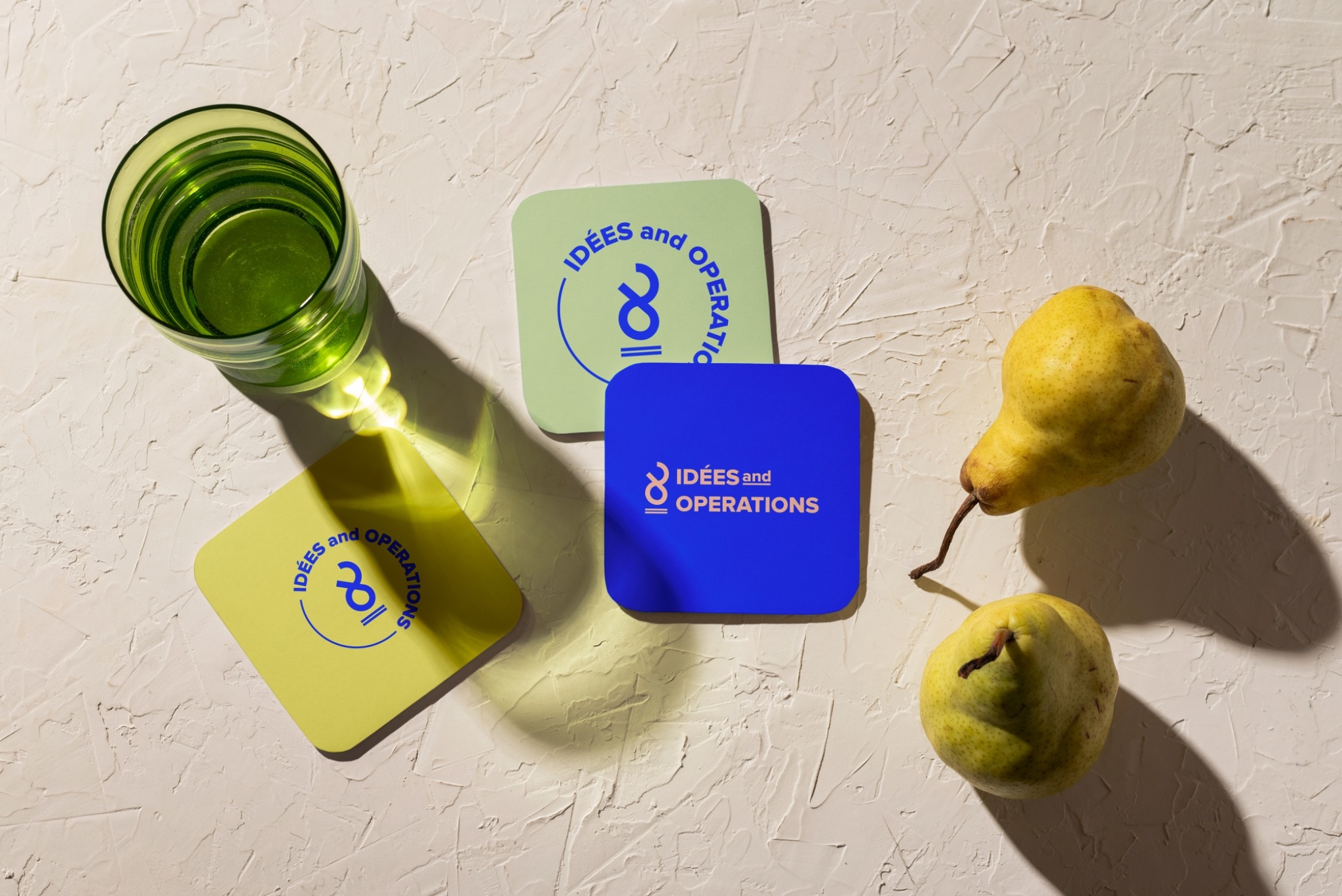 Lime and blue branded coasters